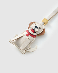 Handmade Golden Retriever leather bag charm with 18K gold-plated keychain clip and engraved STICKYZOO gold tag — for keys, bags, and backpacks. French Alran goatskin.