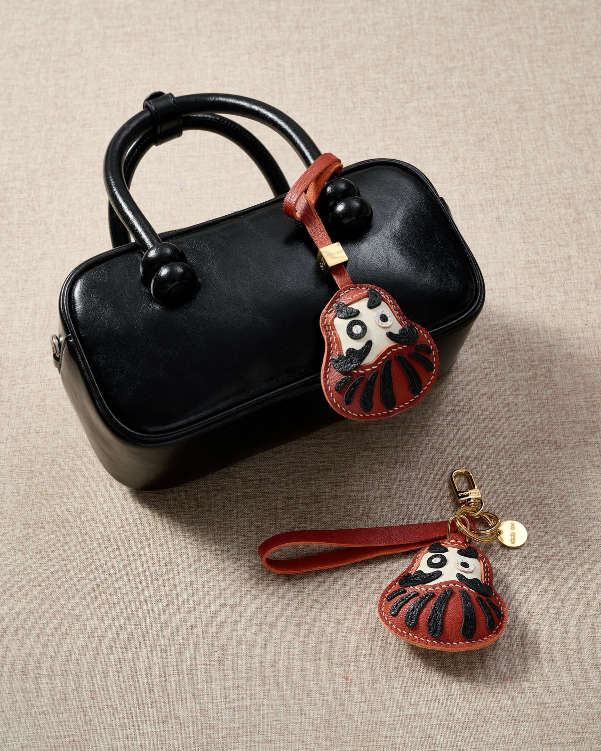 DARUMA CHARM