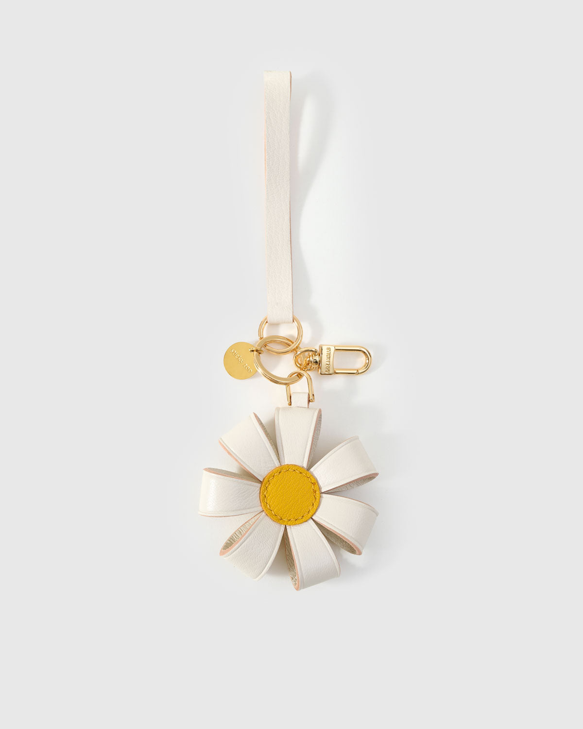 STICKYZOO Daisy Bag Charm — each element hand-cut from French Alran goatskin. Warm taupe. Designed in Amsterdam.