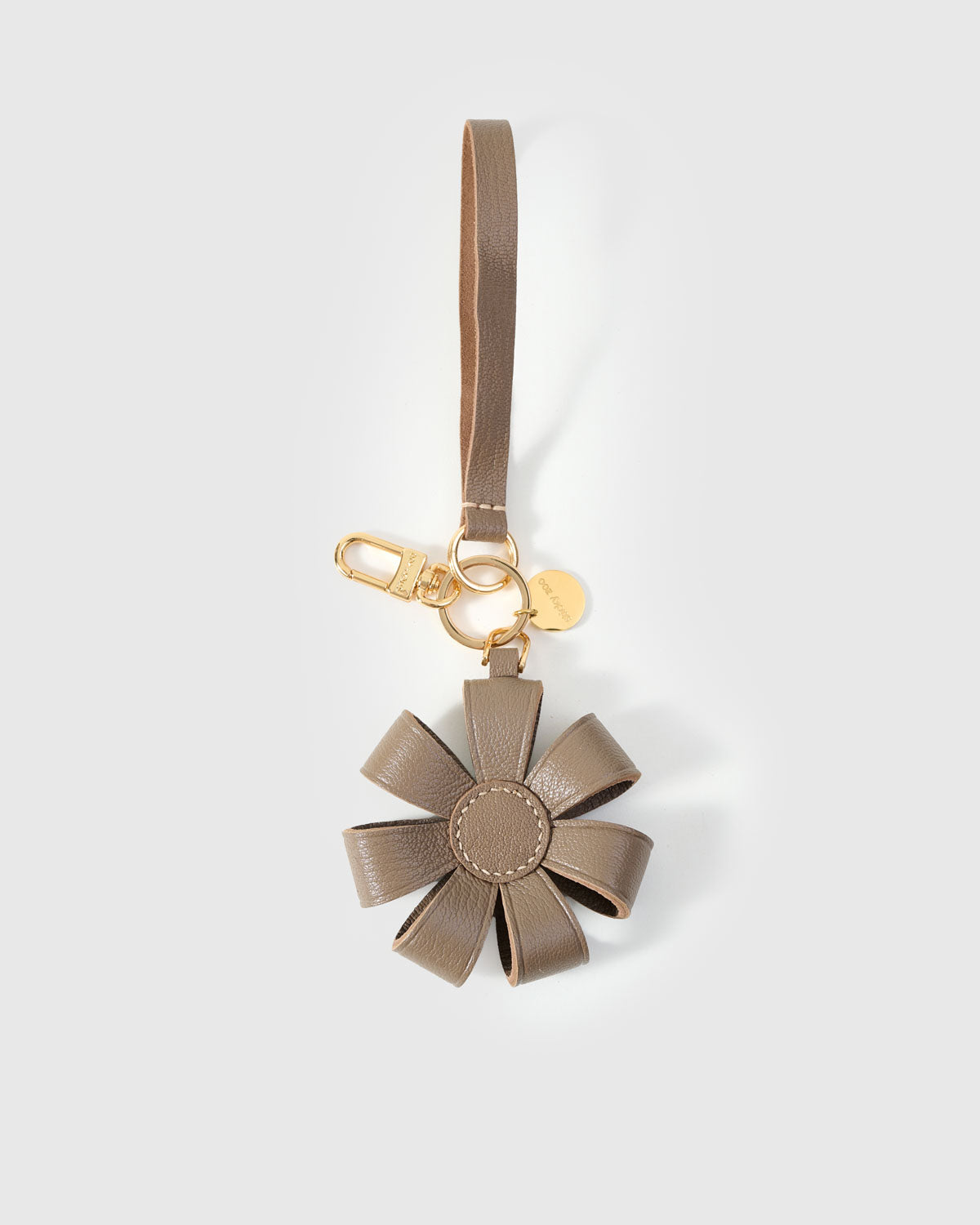 STICKYZOO Daisy Bag Charm in warm taupe French Alran goatskin. Hand-cut, hand-stitched. Designed in Amsterdam.