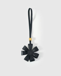 STICKYZOO Daisy Bag Charm — dual attachment option: leather strap for bags or keychain clip. French Alran goatskin.