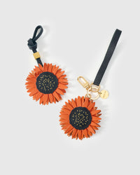 STICKYZOO Sunflower Charm — hand-layered French Alran goatskin, layered sunflower petals with stitched centre. Designed in Amsterdam.