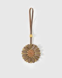 STICKYZOO Daisy Charm — taupe and olive French Alran goatskin petals layered around a warm tan centre disc with hand-stitched seed marks. 3-day handmade piece.