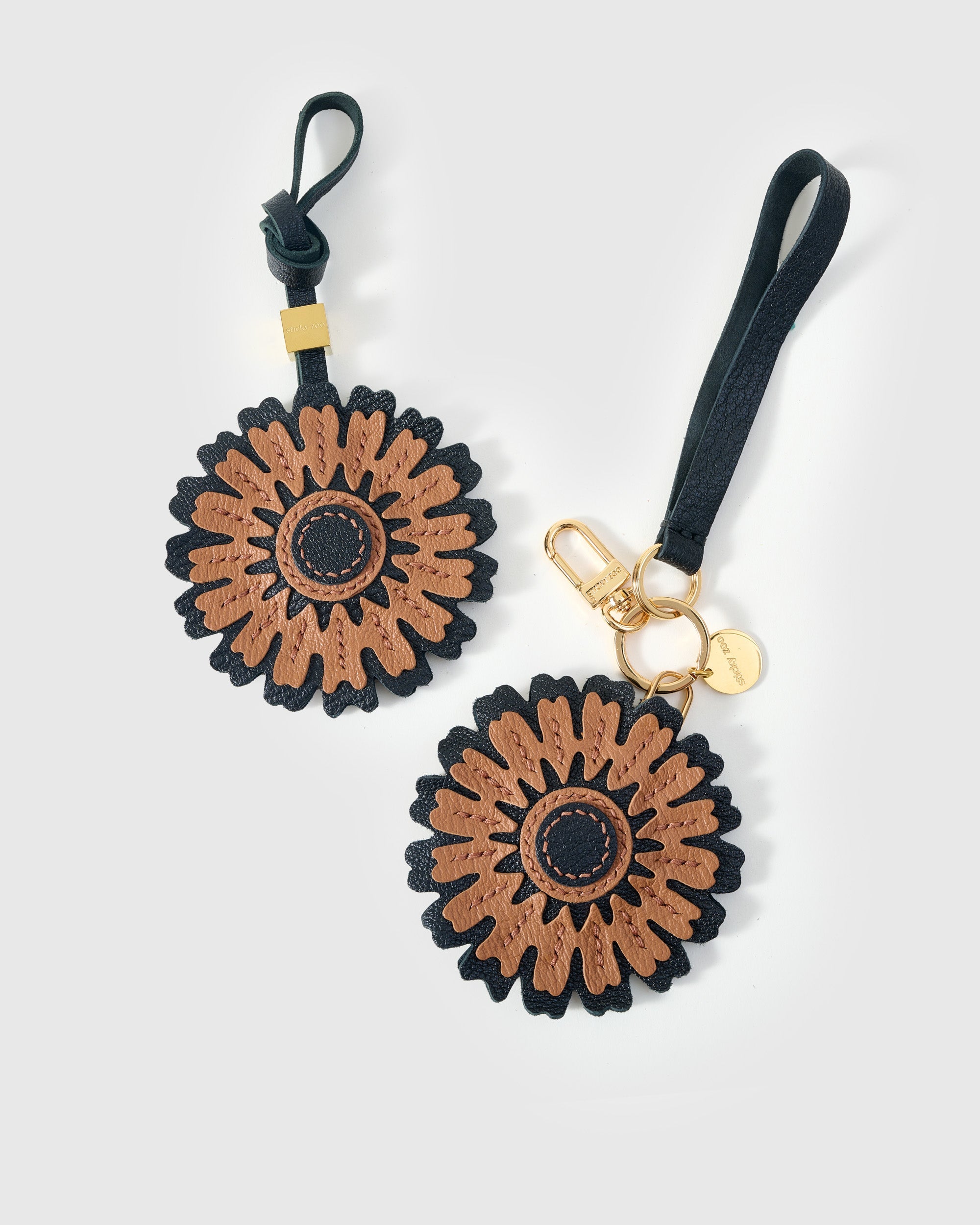 STICKYZOO Sunflower Charm — hand-layered French Alran goatskin, layered sunflower petals with stitched centre. Designed in Amsterdam.