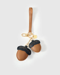 STICKYZOO Acorns Charm in warm tan with dark navy caps French Alran goatskin. Hand-cut, hand-stitched. Designed in Amsterdam.