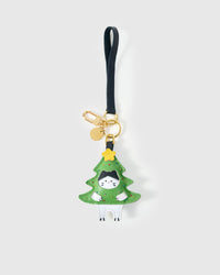 Tight close-up of the kitten in Christmas tree charm face — every detail in real French Alran leather, layered and stitched by hand.