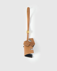 ELEPHANT CHARM charm handmade from French Alran genuine goatskin — An elephant with X eyes, a leather bow, and ears that flop.. Three days by hand. Arrives in luxury gift packaging. Designed in Amsterdam.