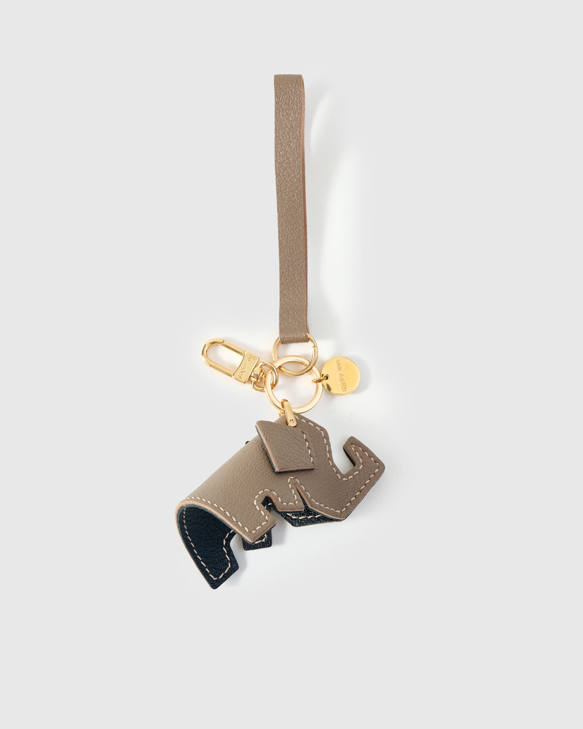 ELEPHANT CHARM on an 18K gold-plated keychain clip with engraved STICKYZOO disc — clips to keys, bags or backpacks.