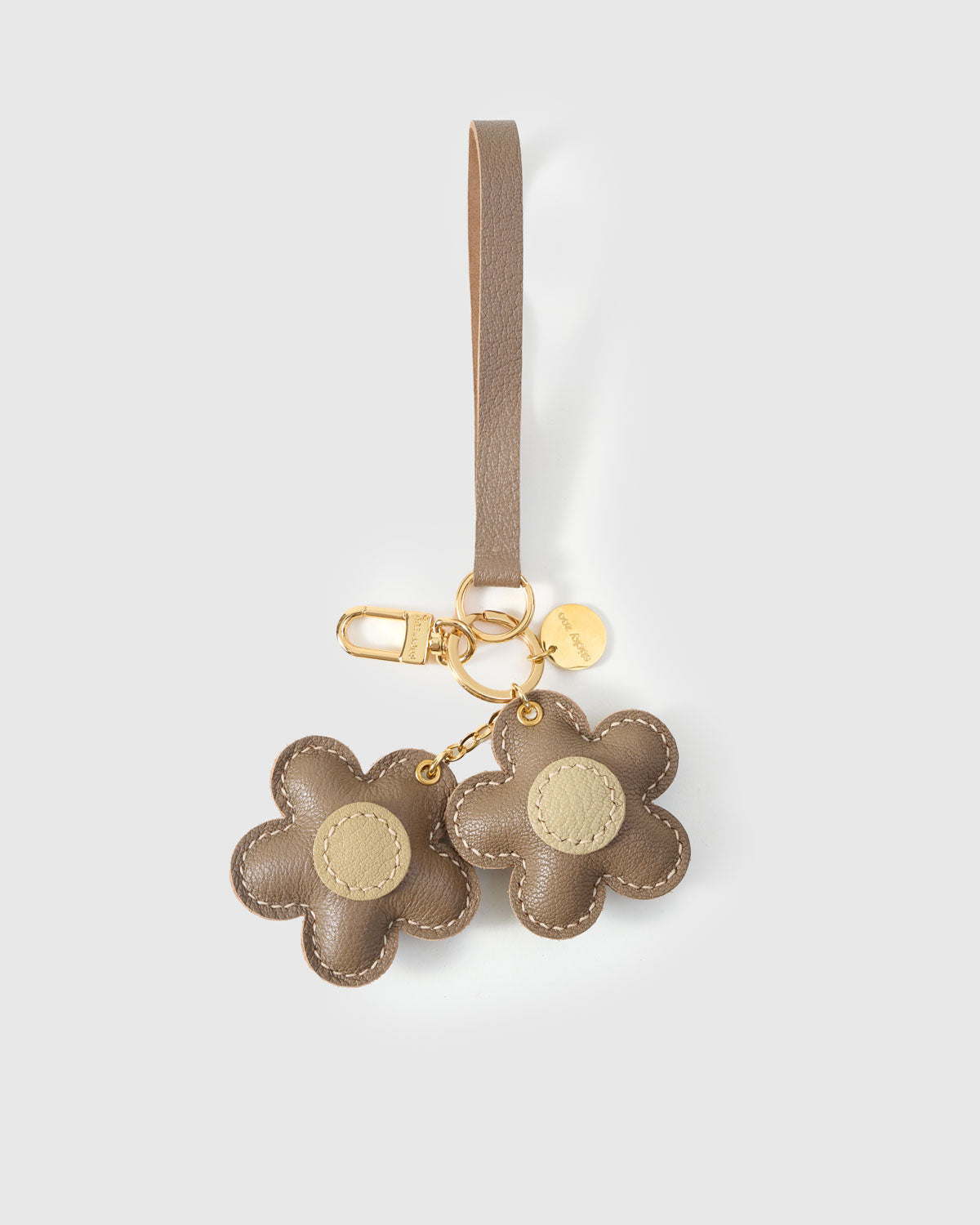STICKYZOO Twin Flowers Charm in navy with tan centres — handmade French Alran goatskin with 18K gold-plated hardware. Arrives gift-ready.