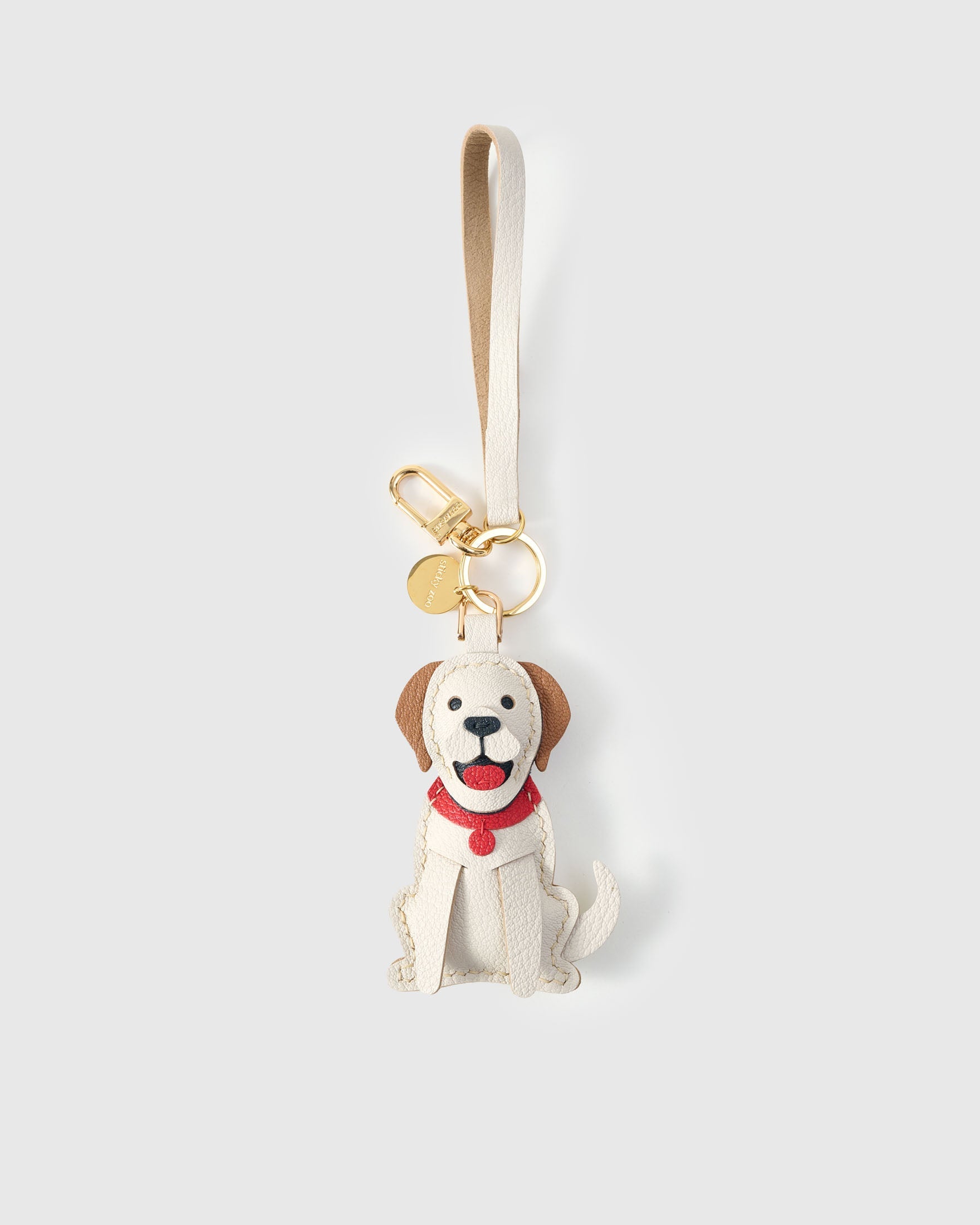 Handmade Golden Retriever leather bag charm — French Alran goatskin from a tannery founded in 1903 in Tarn, France. STICKYZOO.