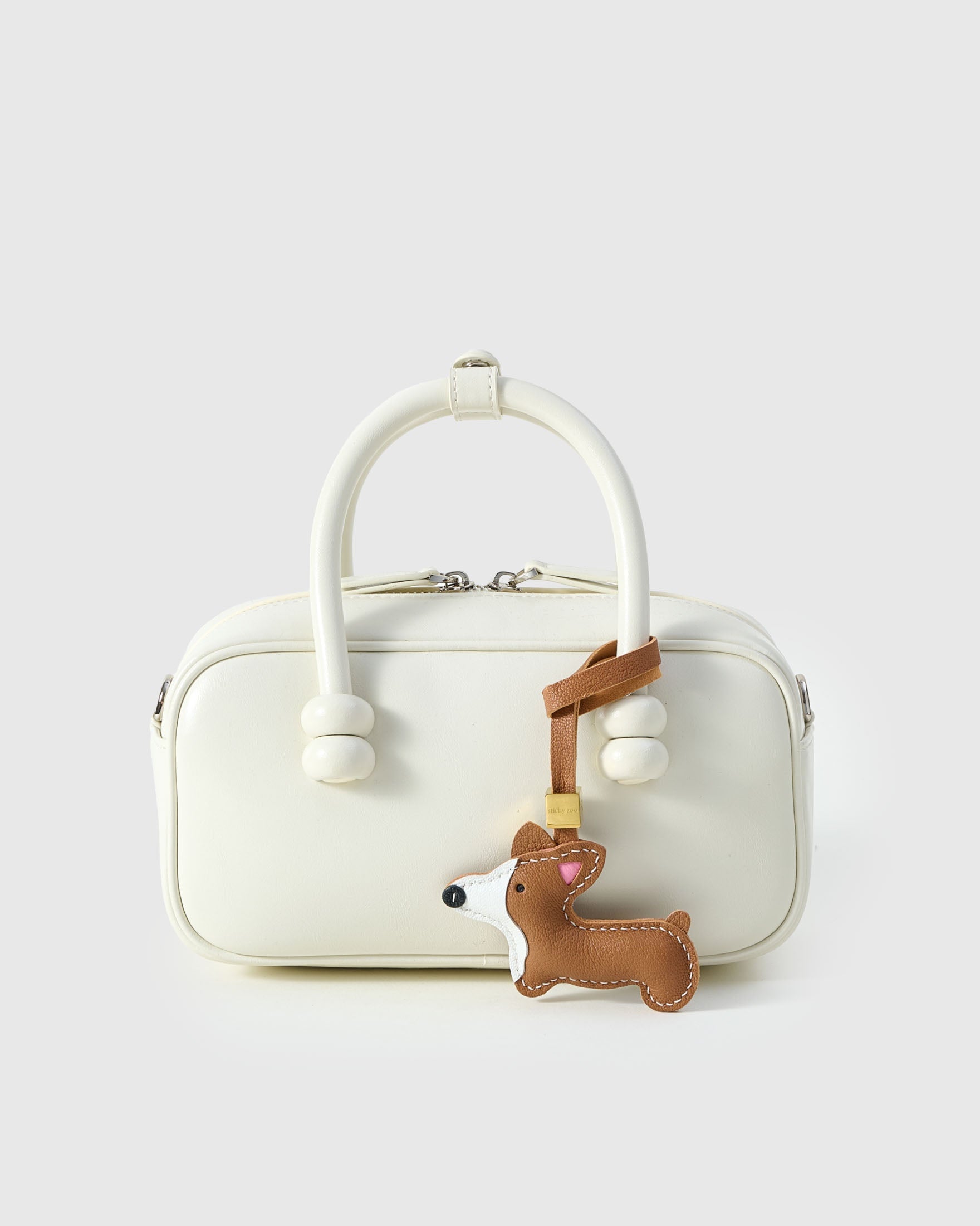 French Alran leather from Tarn, France — founded 1903, Entreprise du Patrimoine Vivant, supplier to the world's top luxury houses. Real leather. Never faux. Never vegan.