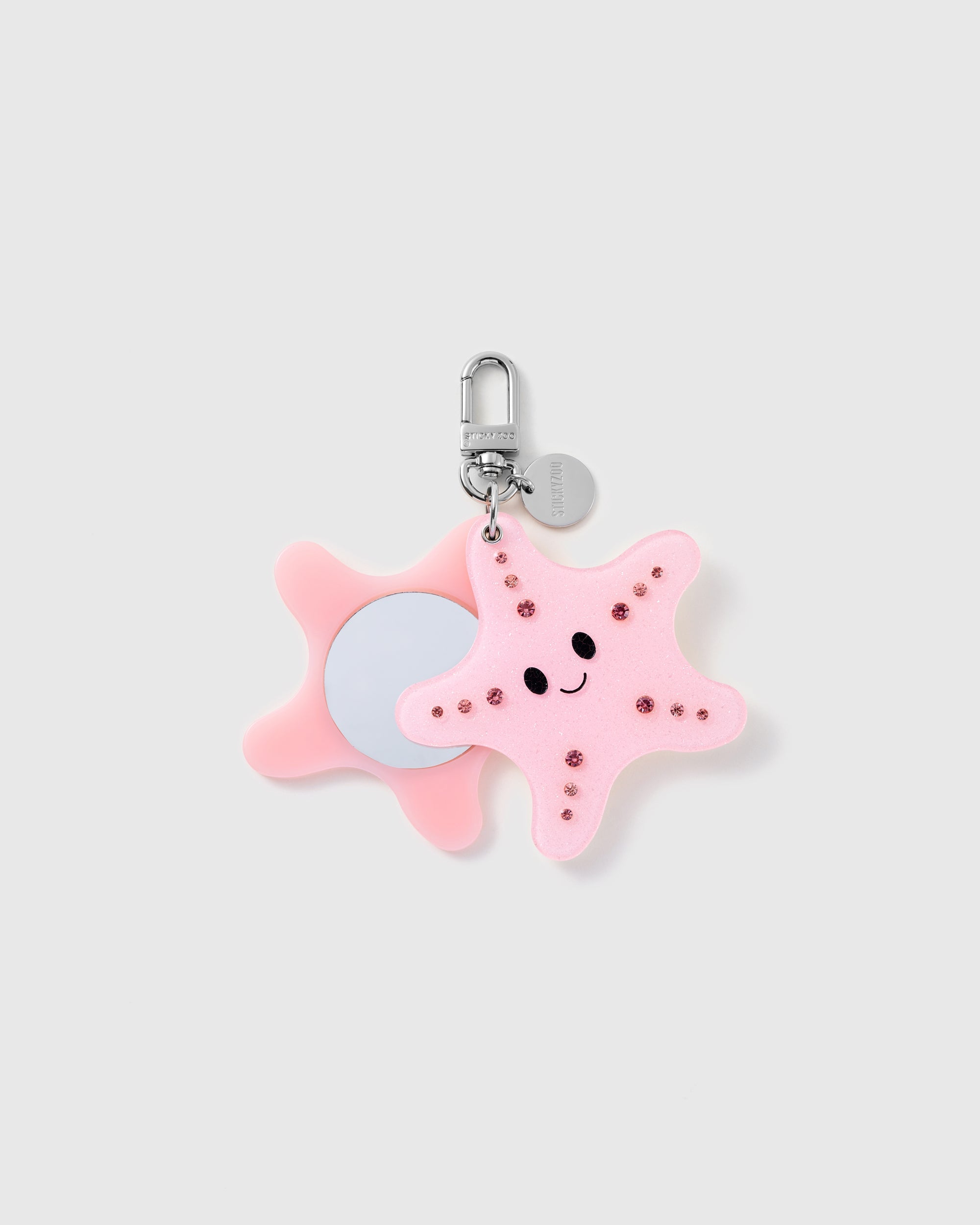 STICKYZOO Stella Starfish Mirror Charm open to reveal the compact mirror beneath its pink character panel.