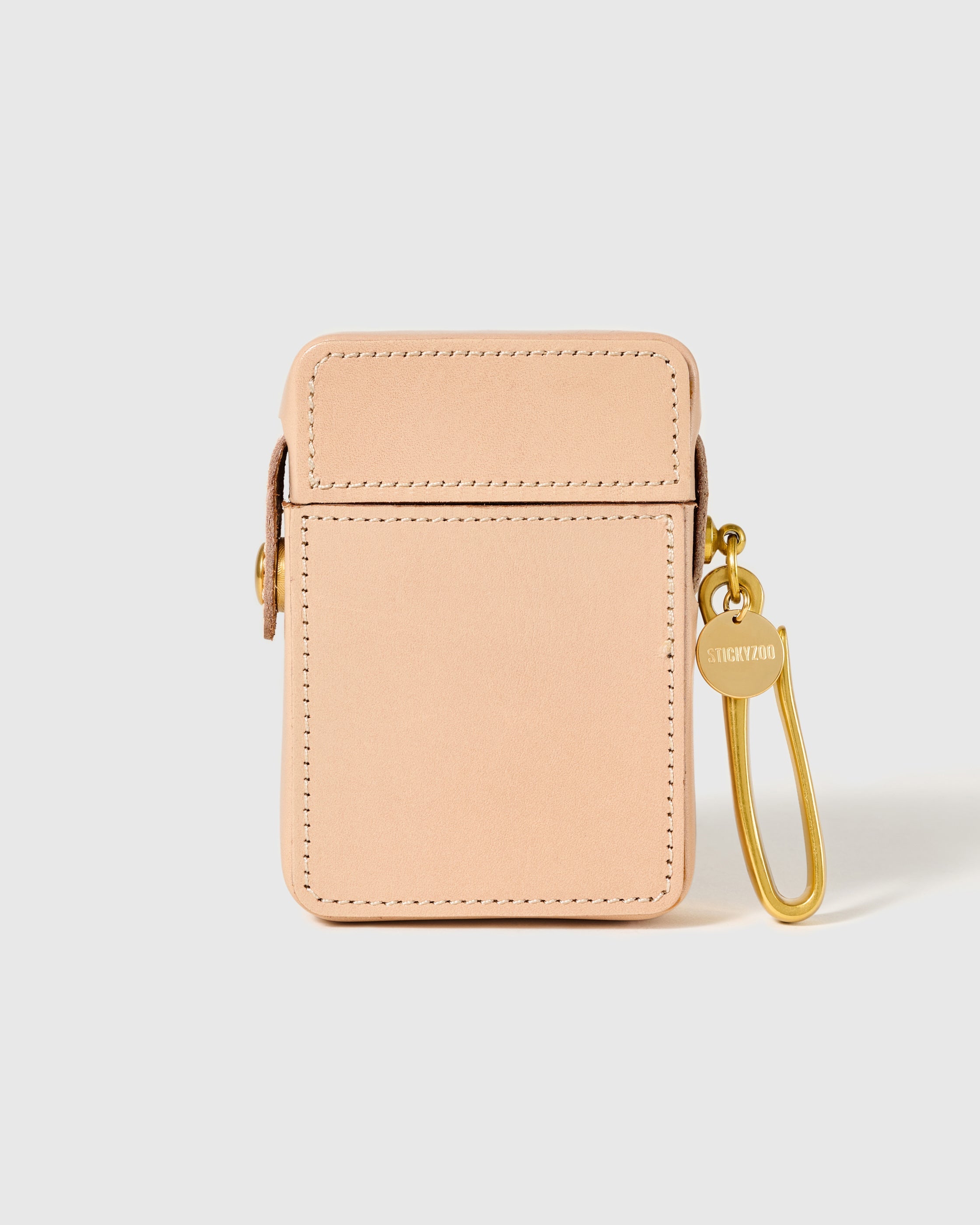 STICKYZOO natural clip-on cigarette case closed, with stitched front panel and gold-tone clip