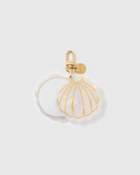 STICKYZOO Serena Moon Shell Mirror Charm open to reveal the compact mirror beneath its pearlescent cream cover.