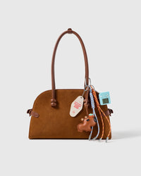 Dachshund Arcade Message Stack Charm attached to a structured handbag to show the complete design