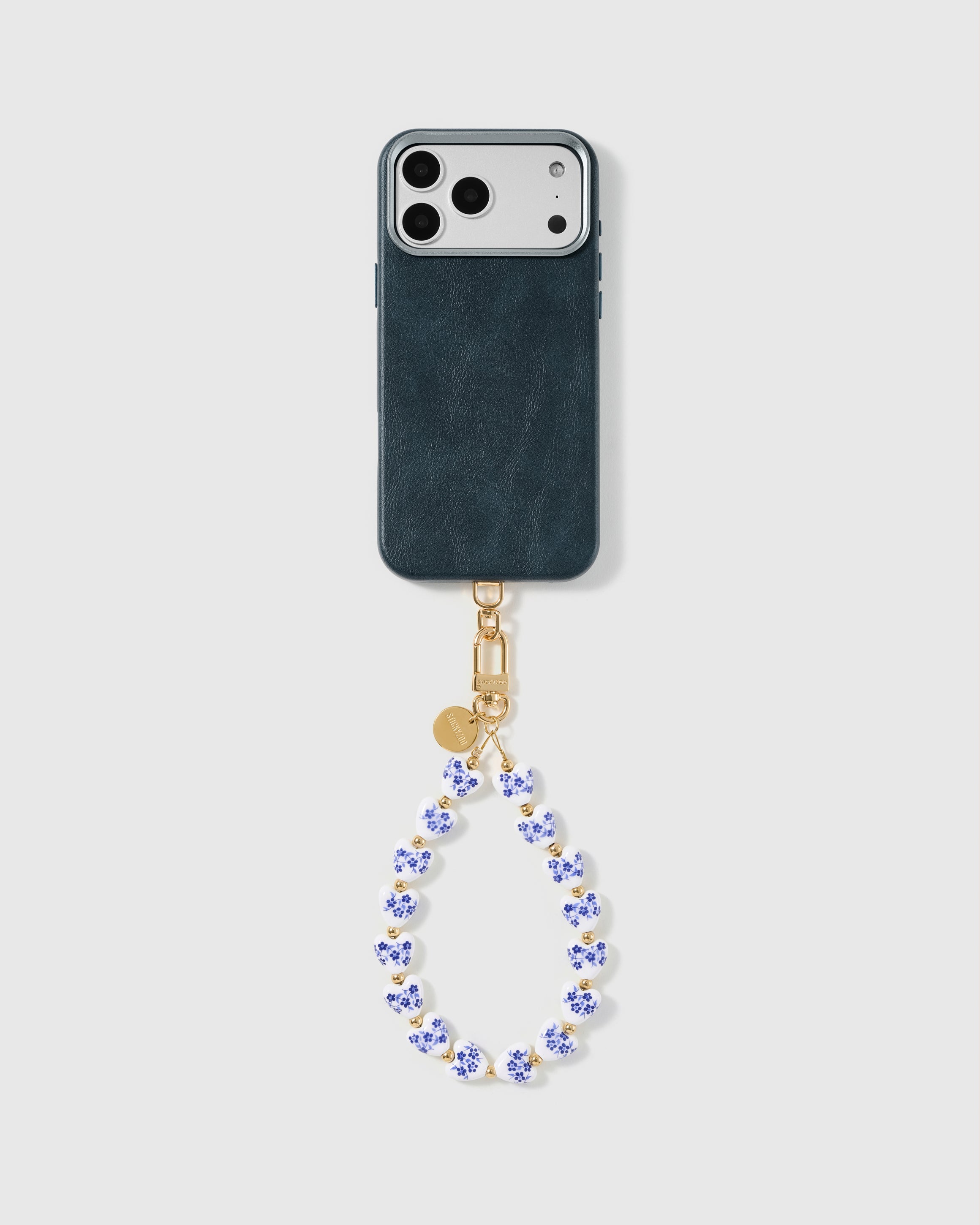 Handmade beaded phone strap on a black case, rated 4.9 across 5,000+ reviews