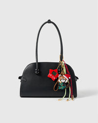 Holiday Red Panda Game Stack Charm attached to a structured handbag to show the complete design