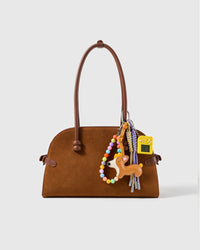 Corgi Arcade Bead Stack Charm attached to a structured handbag to show the complete design