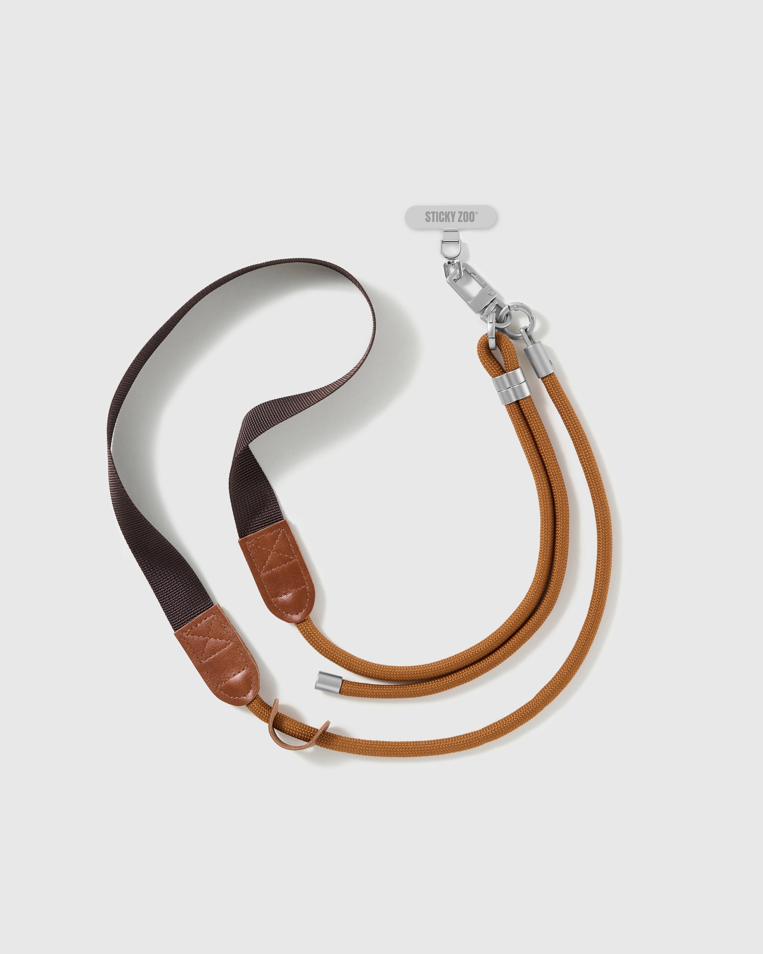 Warm brown adjustable phone strap shown at full length with sliding ring, stitched trim and included Phone Strap Card