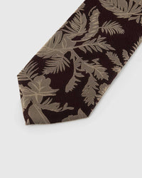 Ivory tropical leaves across dark espresso silk, hand-embroidered with raised thread by STICKYZOO