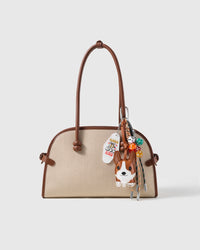 Corgi Lucky Dice Stack Charm attached to a structured handbag to show the complete design