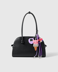 Ice Cream Arcade Stack Charm attached to a structured handbag to show the complete design