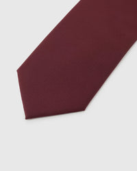 Claret Texture Tie detail showing claret tonal silk texture and the tactile silk surface.