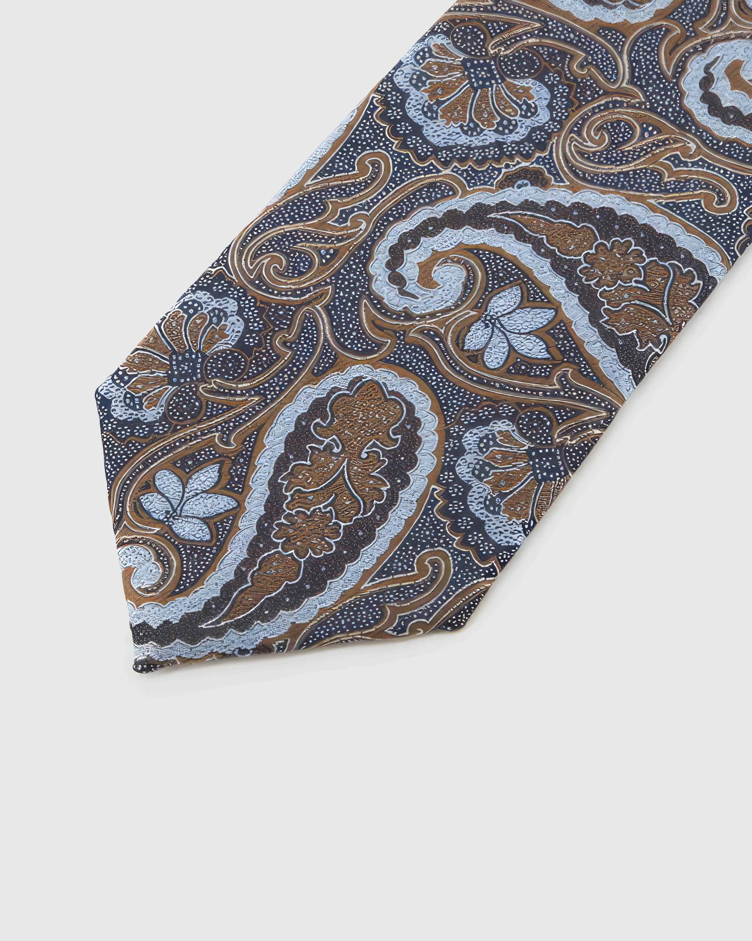 Midnight Chestnut Paisley Tie blade detail showing hand-embroidered large paisley scrolls and silk texture by STICKYZOO