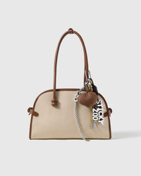 Love Letter Heart Stack Charm attached to a structured handbag to show the complete design