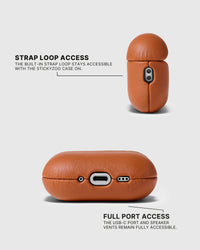 Cognac AirPods case showing the built-in strap loop, USB-C opening and speaker vents