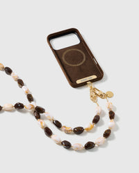 STICKYZOO tortoiseshell resin cross-body strap on a full phone in studio light, kept by 99 percent of buyers