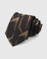 STICKYZOO Obsidian Geometric Arrow Tie in 100% mulberry silk, with angular copper and brass arrows crossing an obsidian ground