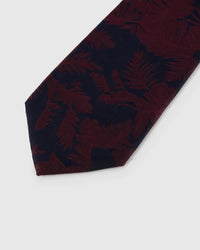 Midnight shadow blooms across claret crosshatched silk, hand-embroidered with raised thread by STICKYZOO
