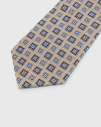 Champagne Mosaic Tie blade detail showing hand-embroidered alternating geometric mosaic squares and silk texture by STICKYZOO