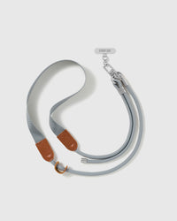 Hand-assembled grey cord and webbing phone strap shown at full length beside the included Phone Strap Card