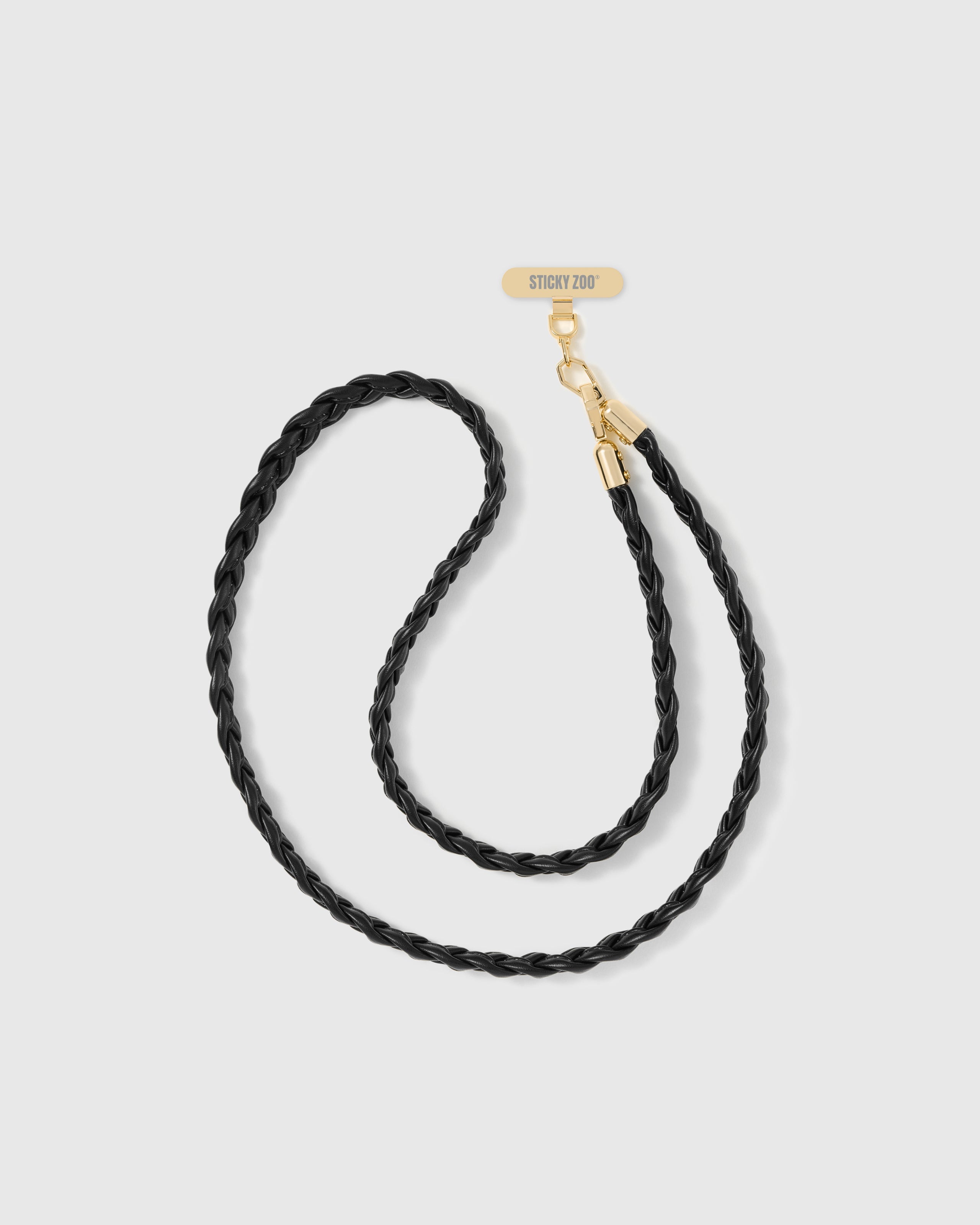 Full-length hand-braided black phone strap shown with gold-plated hardware and included Phone Strap Card