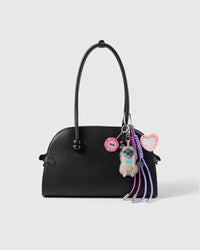 Lucky Cat Heart Stack Charm attached to a structured handbag to show the complete design