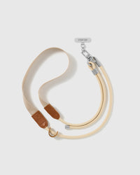Hand-assembled ivory cord and webbing phone strap shown at full length beside the included Phone Strap Card