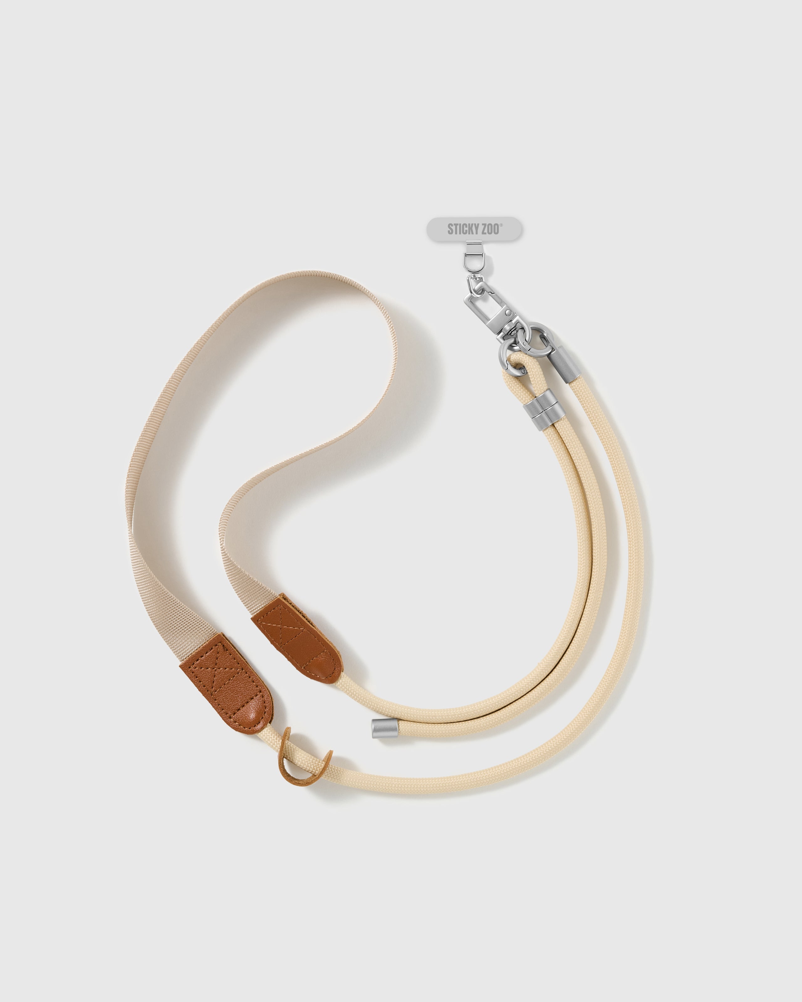 Hand-assembled ivory cord and webbing phone strap shown at full length beside the included Phone Strap Card