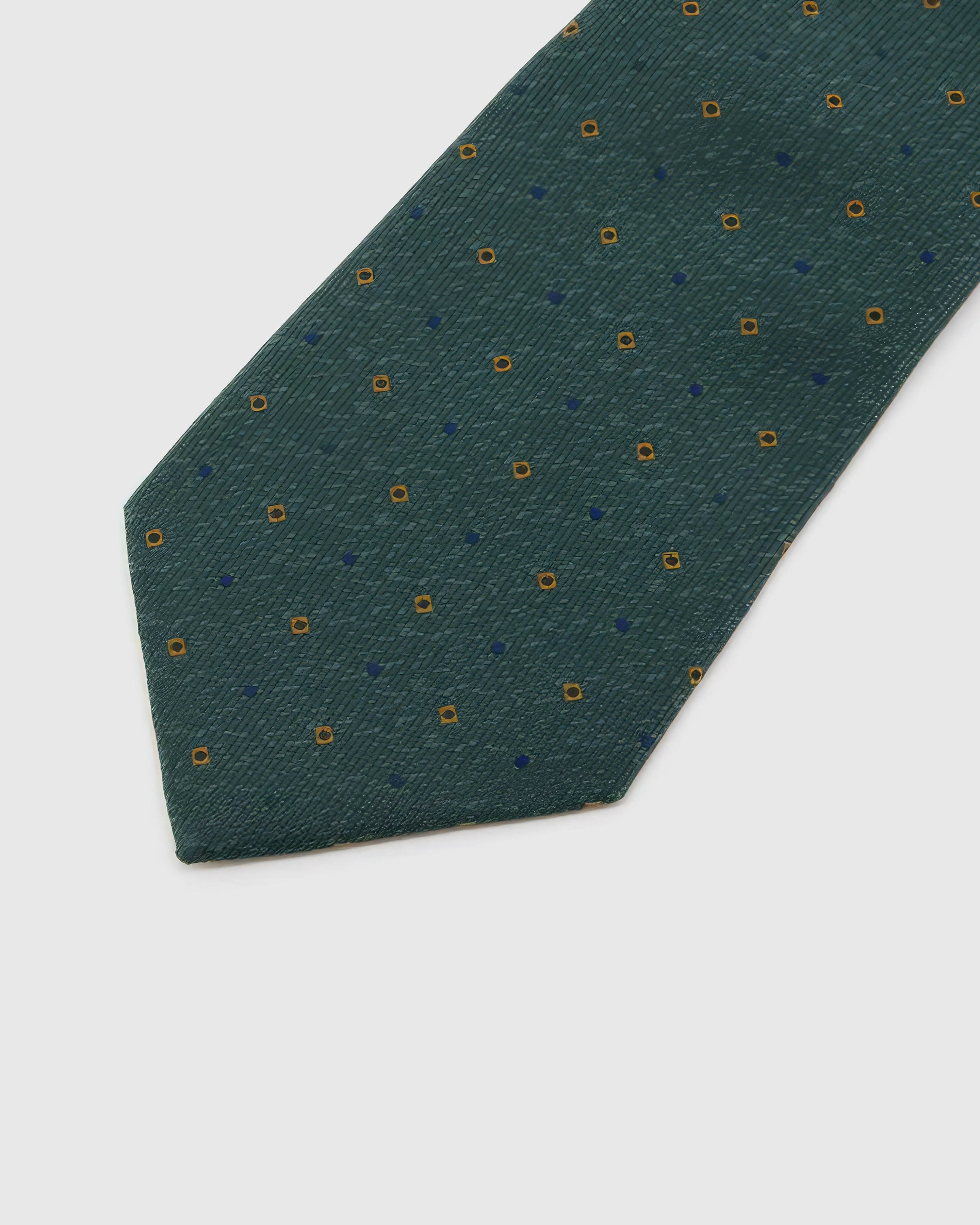 Forest Micro Tile Tie blade detail showing hand-embroidered micro open tiles and dots and silk texture by STICKYZOO