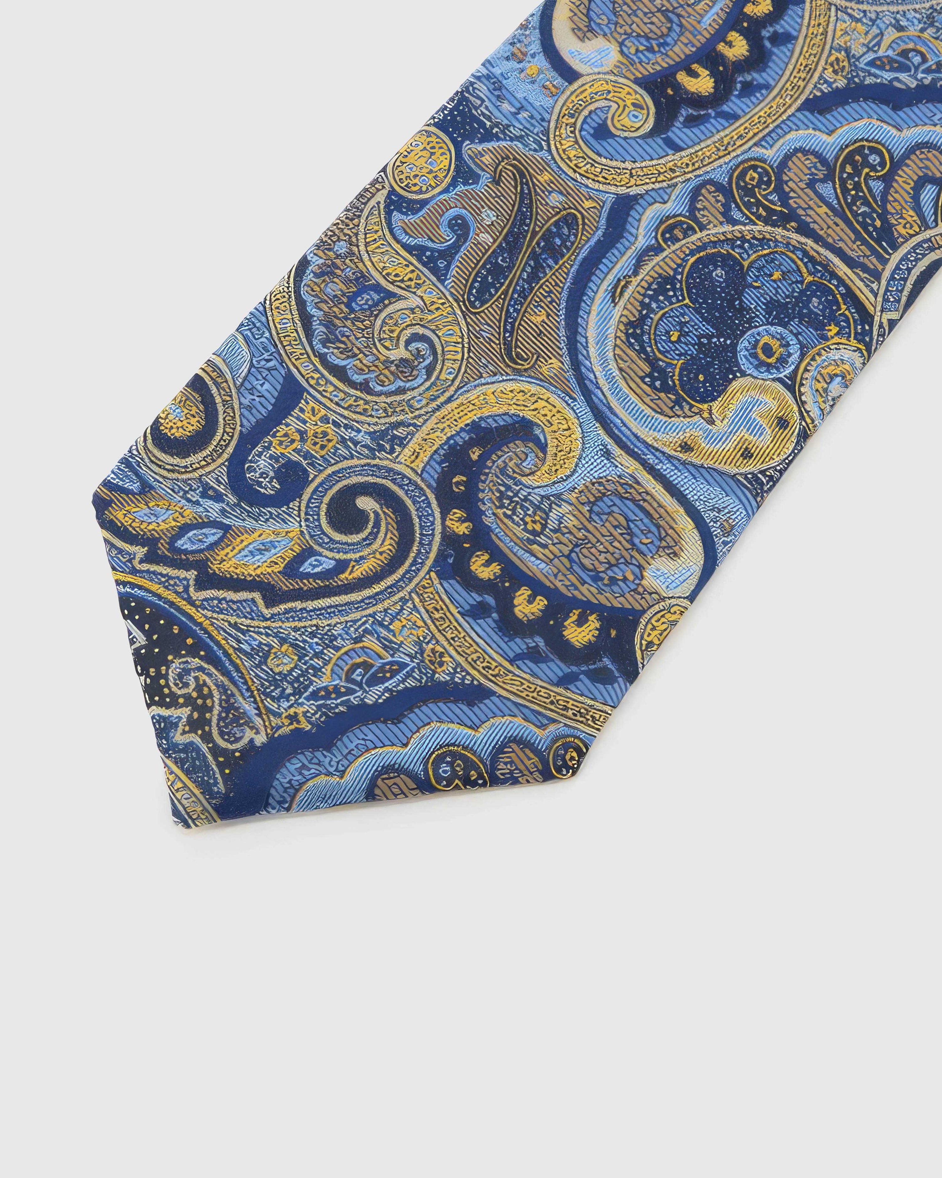 Cobalt Baroque Tie blade detail showing hand-embroidered ornate baroque paisley scrollwork and silk texture by STICKYZOO