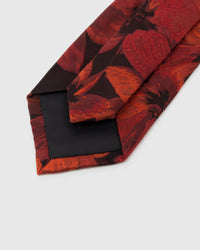 STICKYZOO Oxblood Scarlet Bloom Tie reverse showing structured interlining and hand-finished slip stitching, 145 × 8 cm.