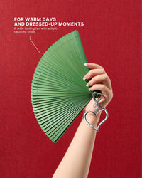 Jade all-bamboo folding hand fan held open for a warm-weather occasion