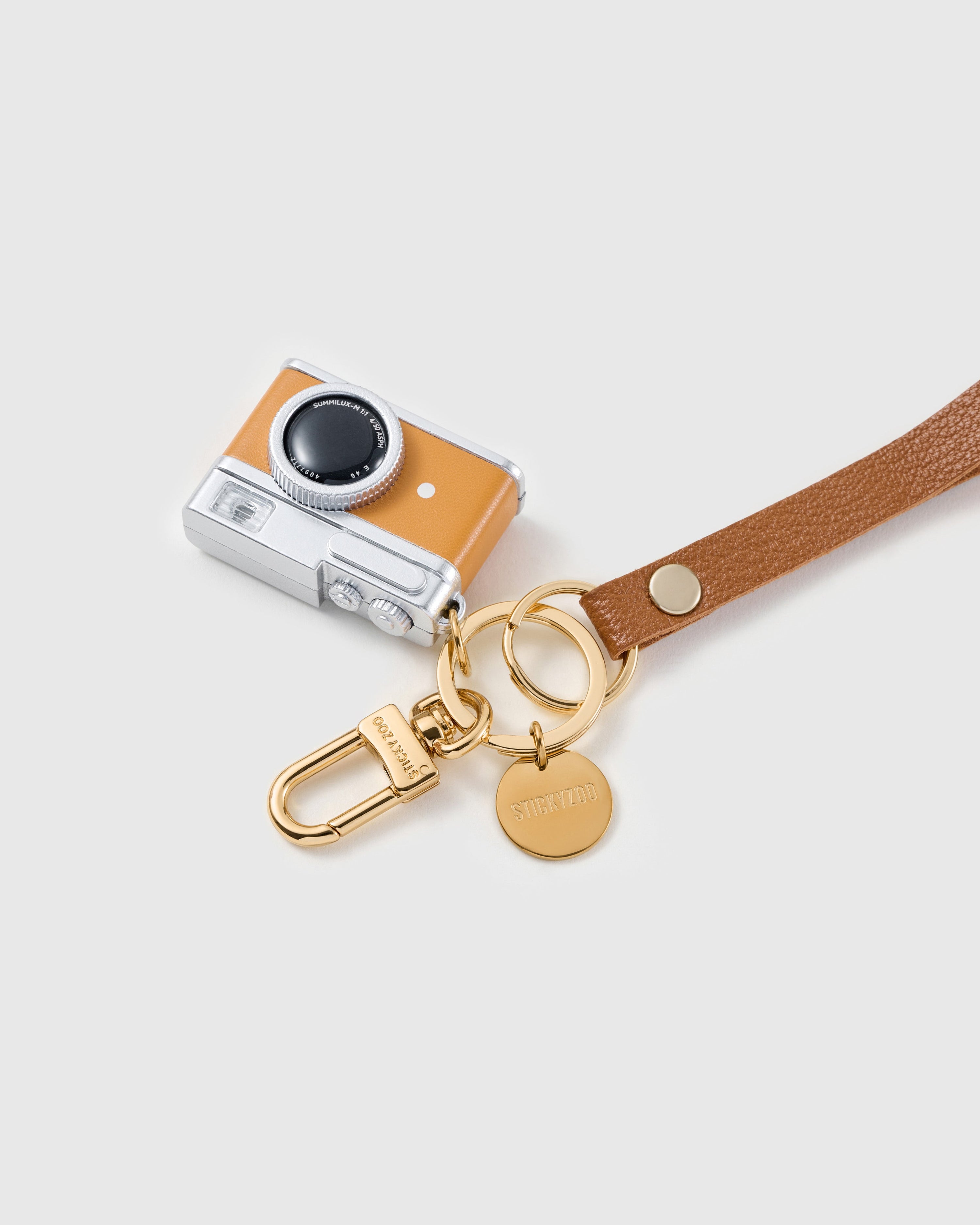 TANGERINE LENS LEATHER PHONE STRAP