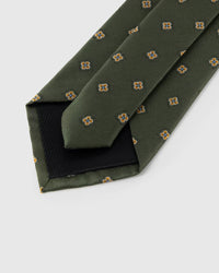 Back of STICKYZOO Olive Mini Bloom Tie showing structured interlining, hand-finished folds and slip stitching, 145 × 8 cm