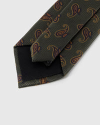 Back of STICKYZOO Hunter Amber Paisley Tie showing structured interlining, hand-finished folds and slip stitching, 145 × 8 cm