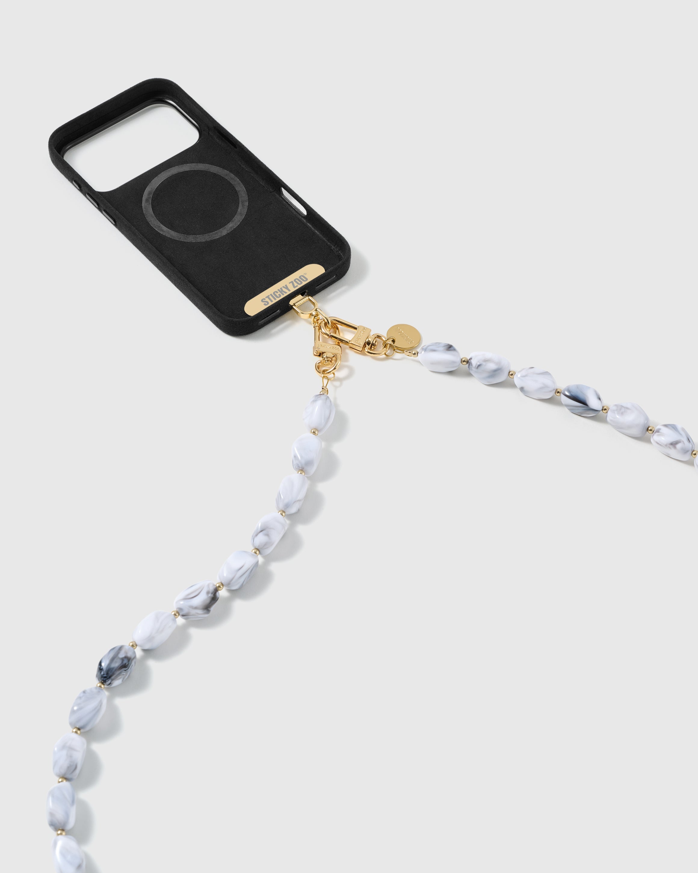 Dual-clasp beaded cross-body strap clipped to a phone case, showing universal fit via the included Phone Strap Card