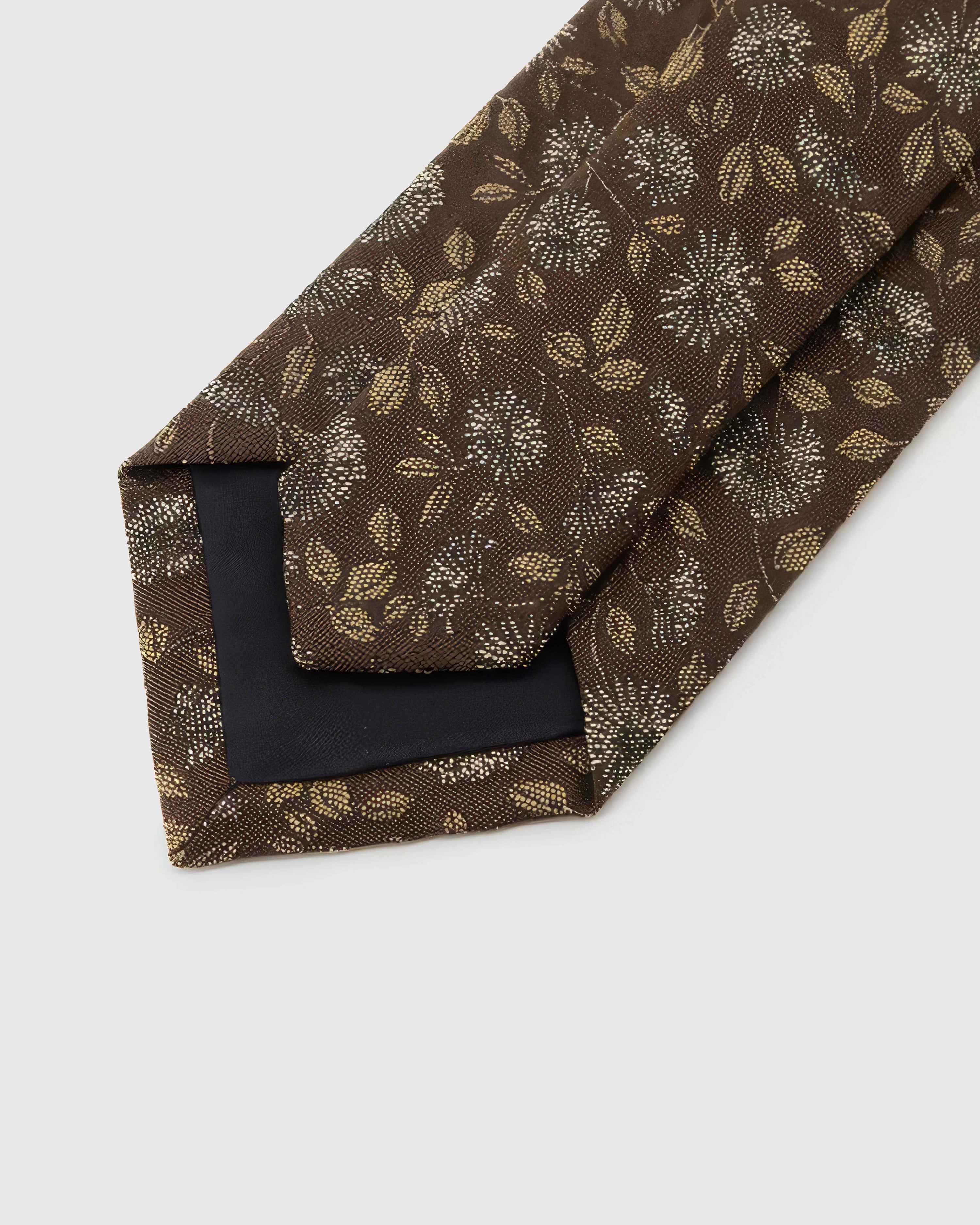 STICKYZOO Espresso Ivory Bloom Tie reverse showing structured interlining and hand-finished slip stitching, 145 × 8 cm.