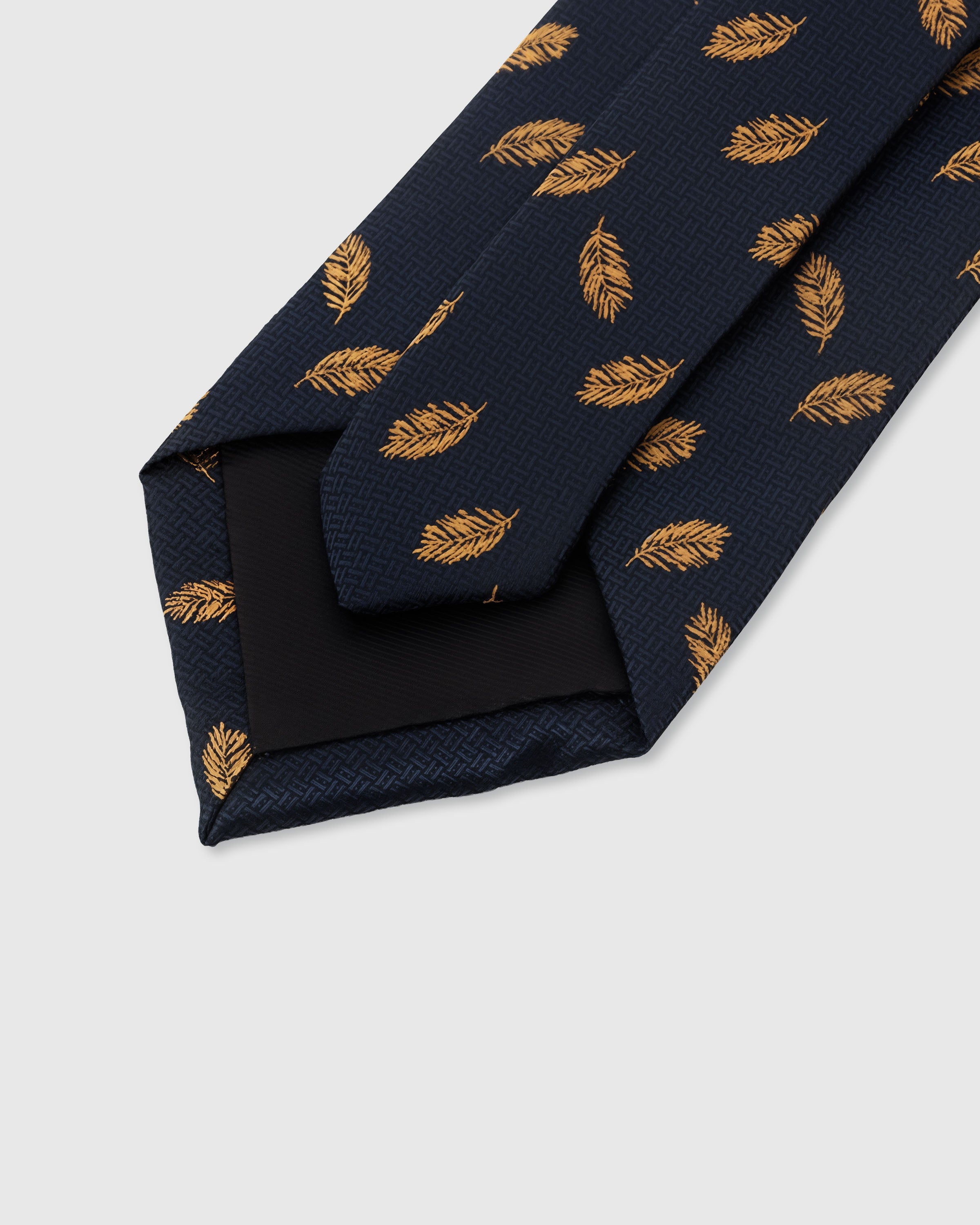 NAVY FEATHER TIE