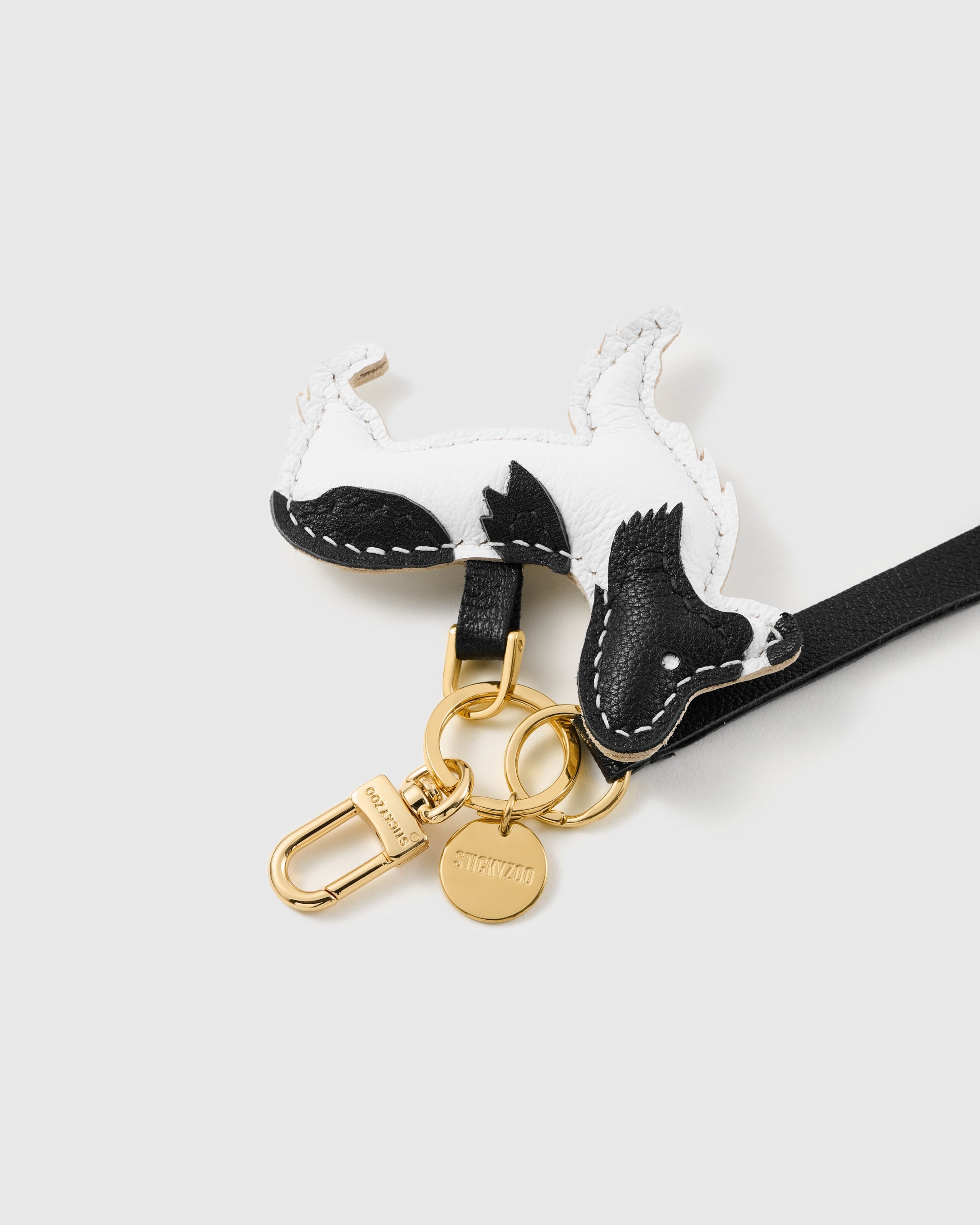 NOIR PATCH PUP LEATHER PHONE STRAP
